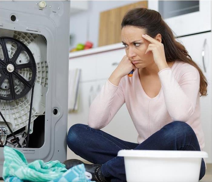 woman next to appliance